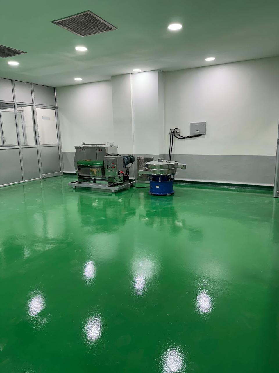 Blending and sifting room with ribbon mixer and vibratory sifter